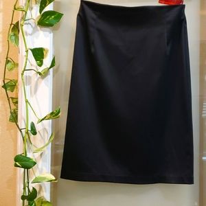 Ticci tonetto dressy black skirt size L